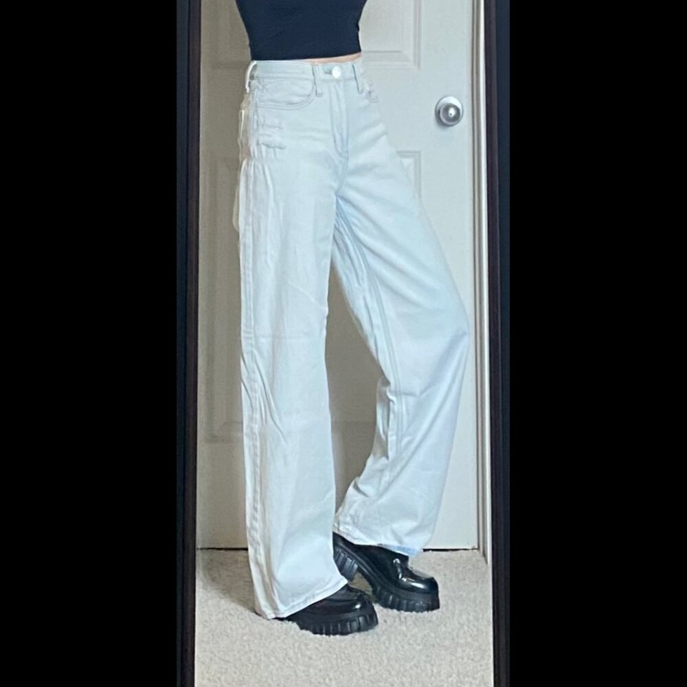 Super High Rise Wide Leg Distressed Jeans in Light Blue Shade. Size 5 / 27
